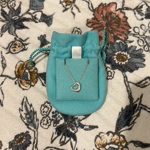 Silver Tiffany & Co. small heart necklace.